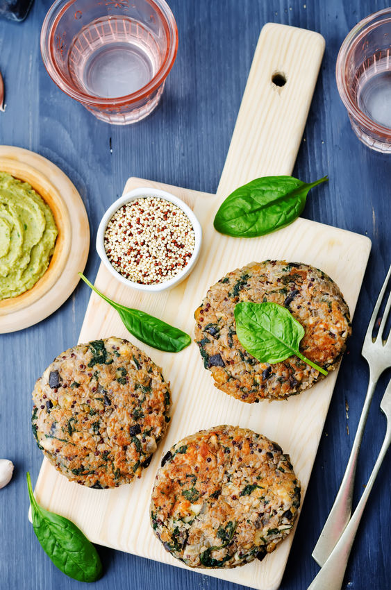 47945597 – vegan quinoa eggplant spinach chickpeas burger.